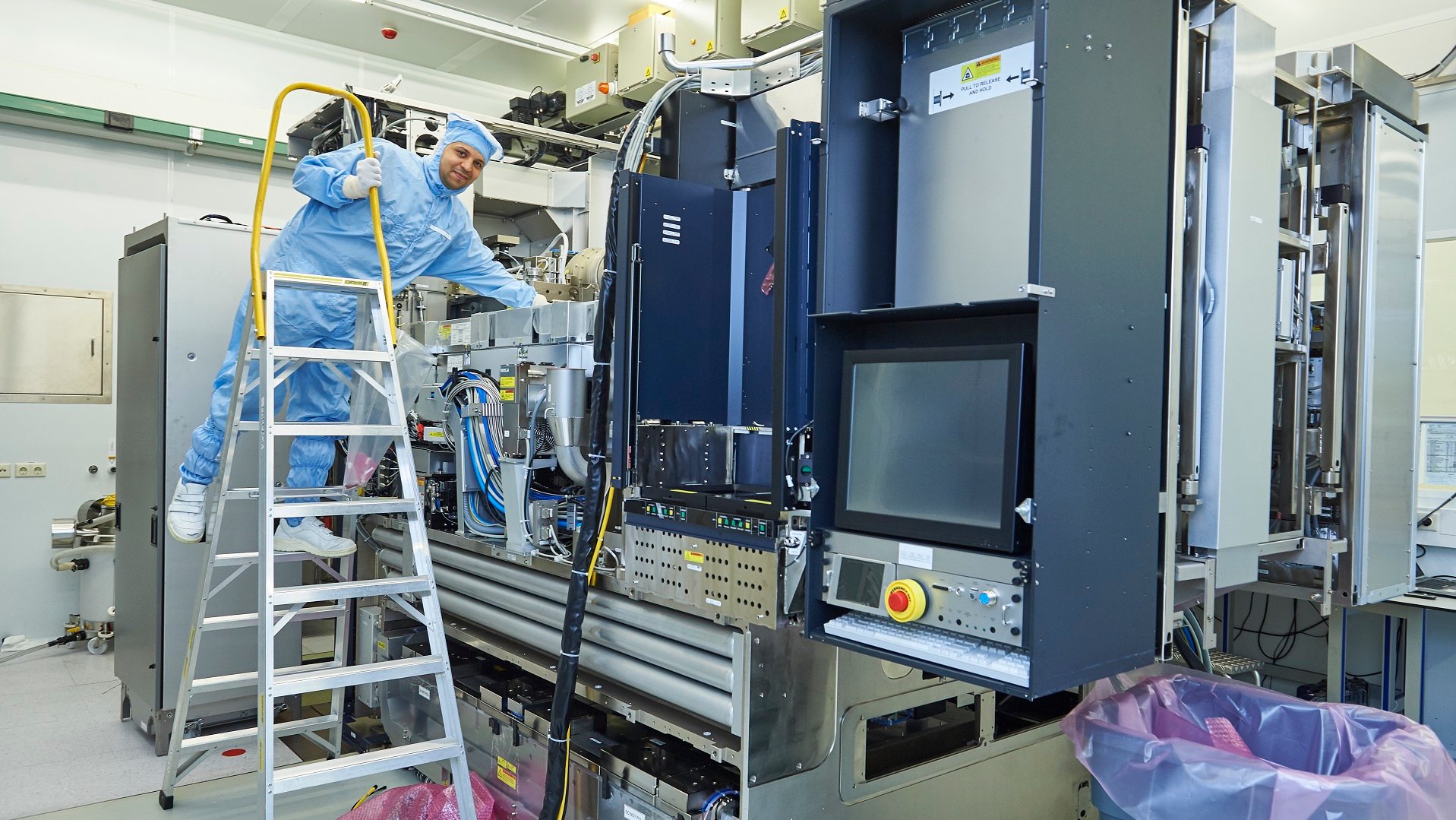 ASML engineer in cleanroom ASML engineer in cleanroom