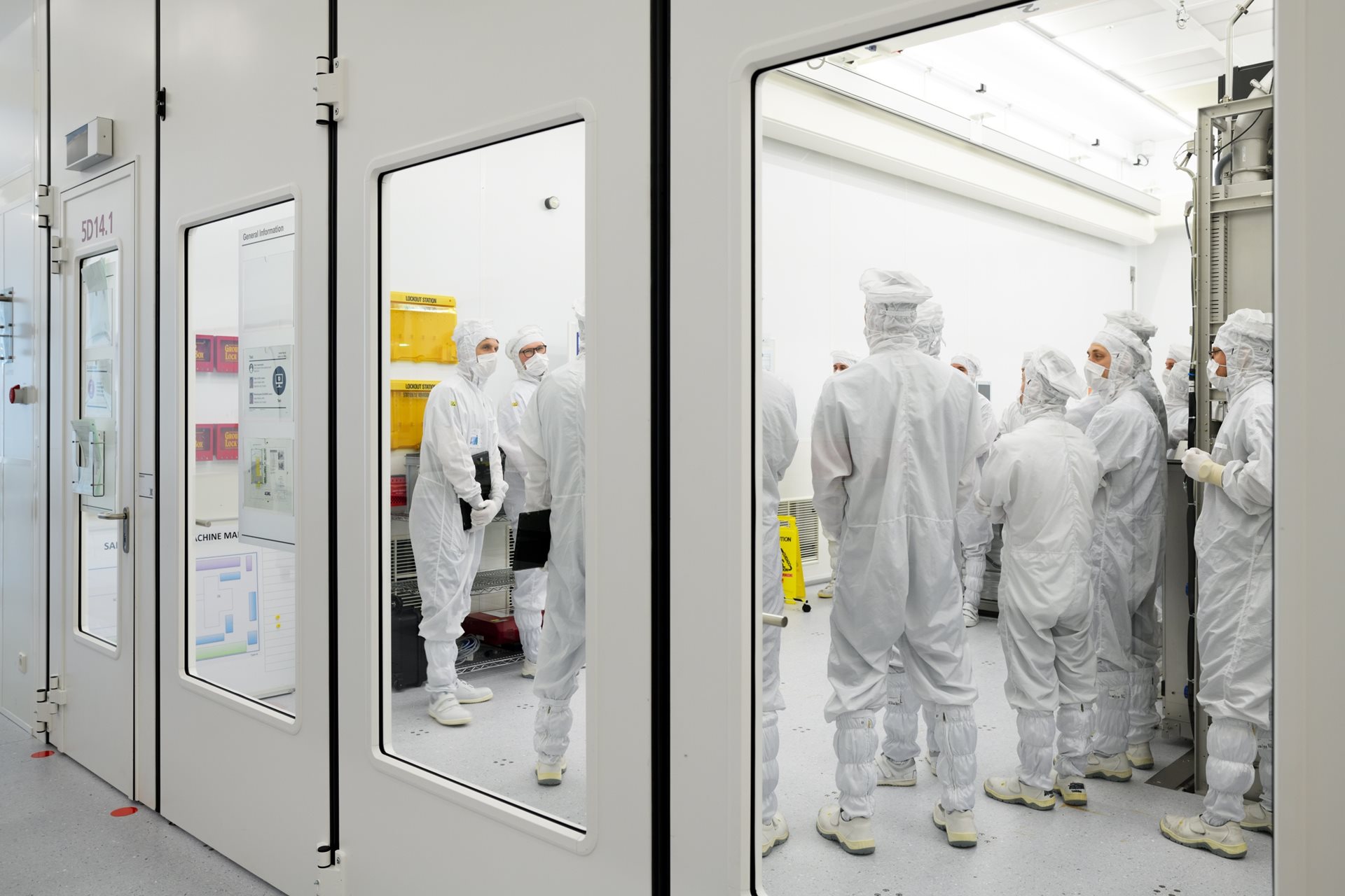 ASML employees working in a cleanroom