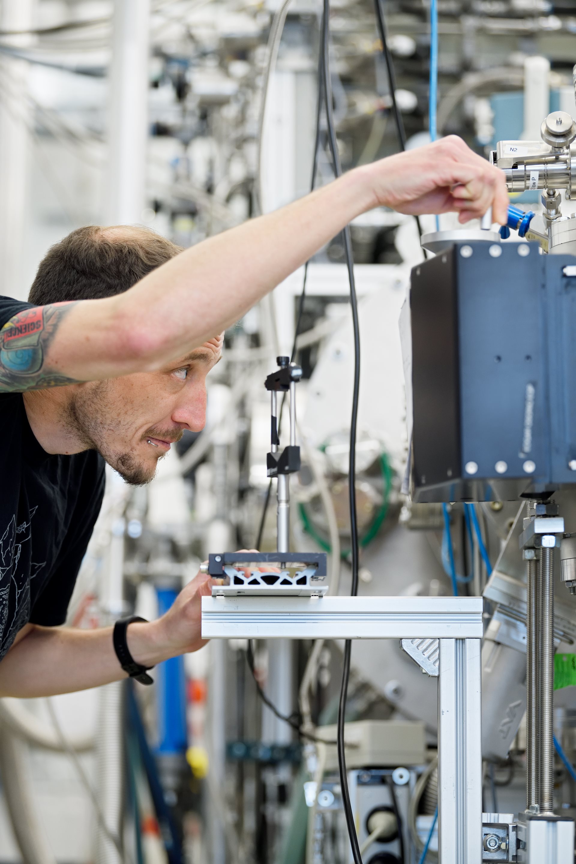 ASML engineer is working in the cleanroom