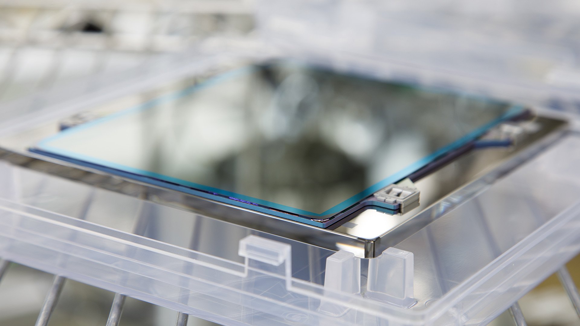 A close-up shot of an ASML EUV pellicle. A close-up shot of an ASML EUV pellicle.