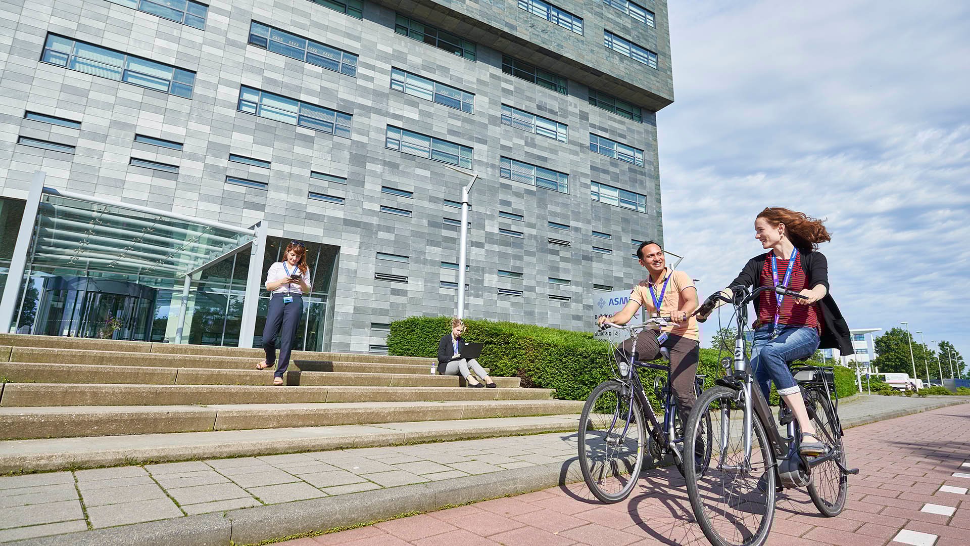 Employees biking together