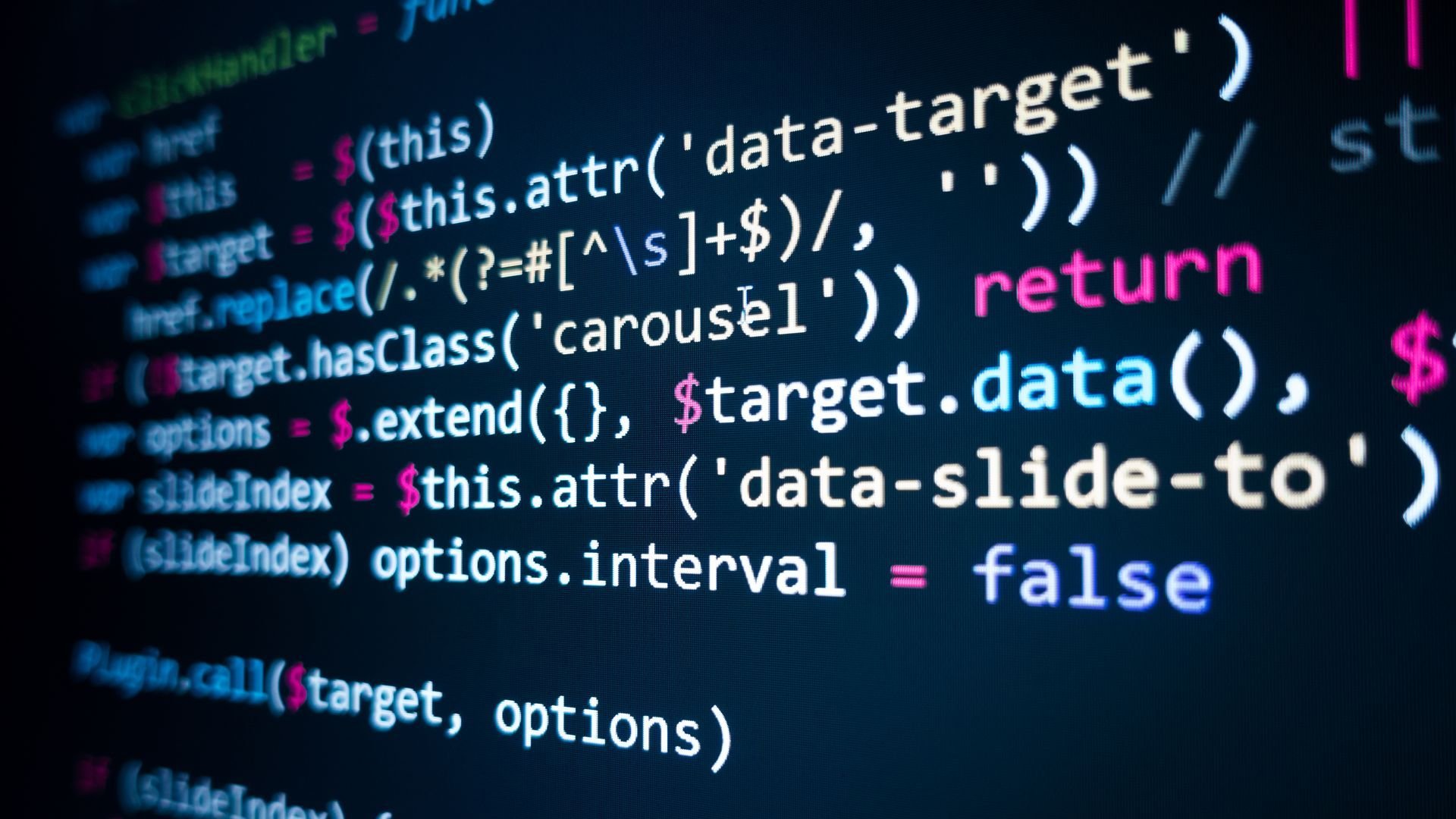 Lines of colored code on a black background.