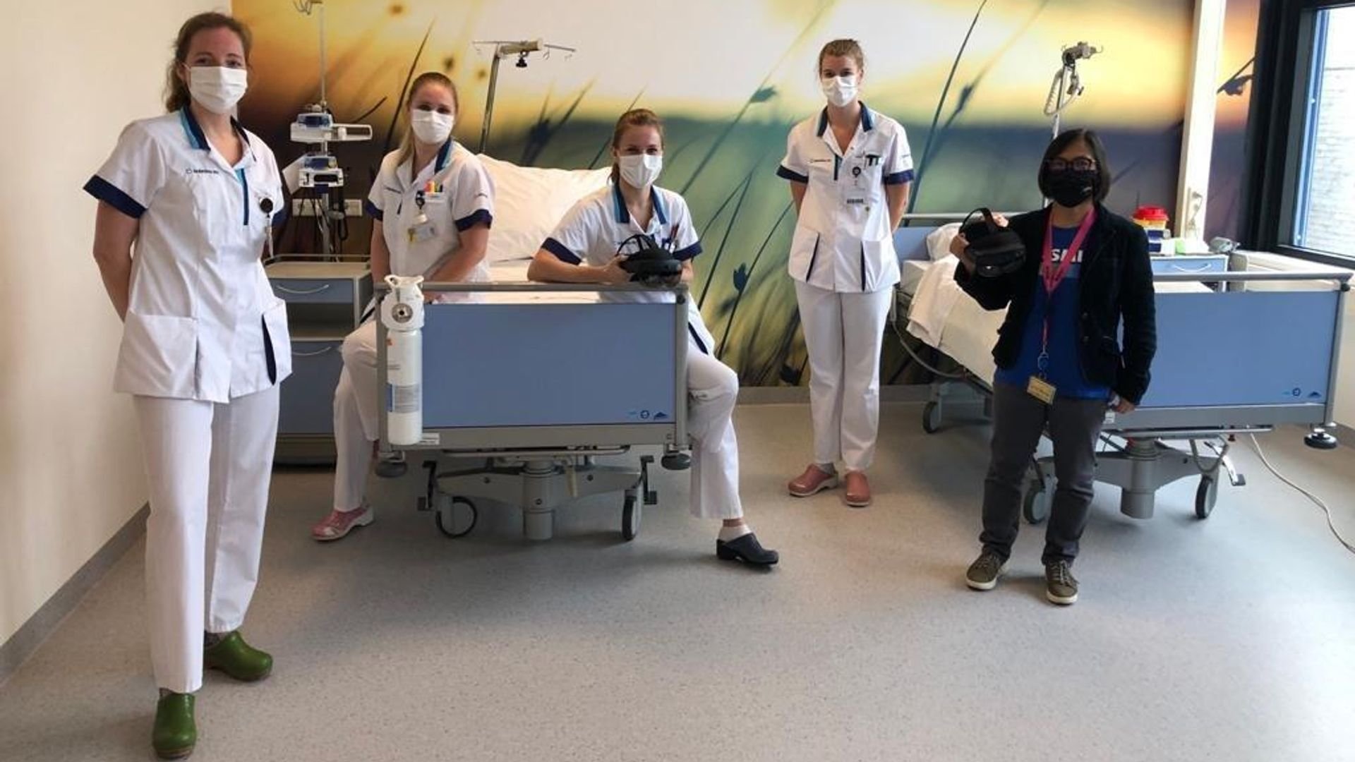 Dulce and colleagues from ASML introduce the Microsoft Hololens headset to the hospital team Dulce and colleagues from ASML introduce the Microsoft Hololens headset to the hospital team