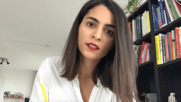 woman looking at camera during online interview with ASML woman looking at camera during online interview with ASML